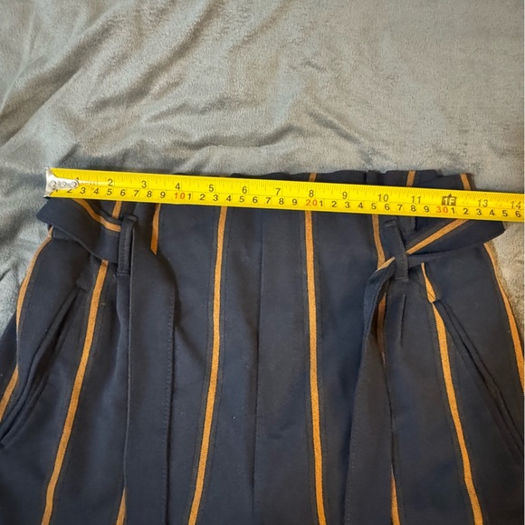 Zara Orange and Navy Blue Trousers with Stripes

#1131 - Picture 5 of 7